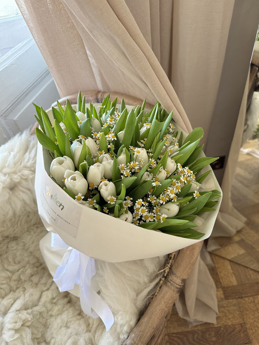 50 white tulips with chamomile