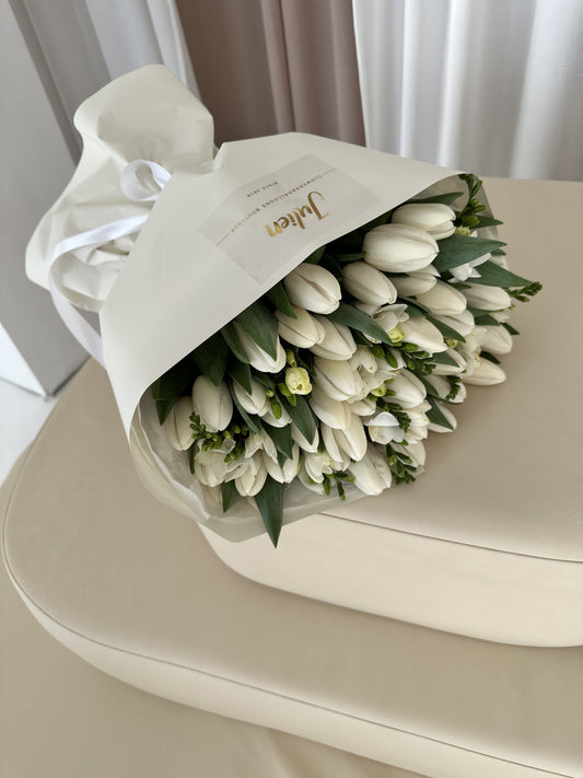 50 white tulips with freesia